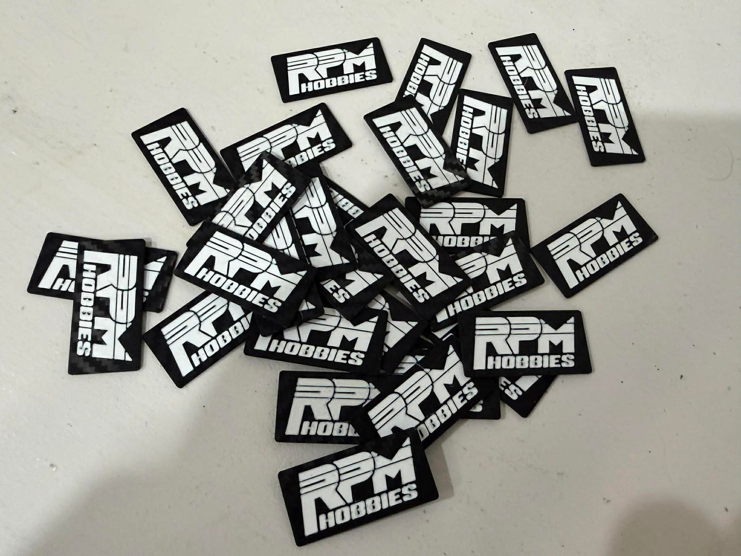 RPM WING ENDPLATES FOR 1/10TH EP ONROAD - WHITE LOGO 4pcs Carbon Fibre Effect.
