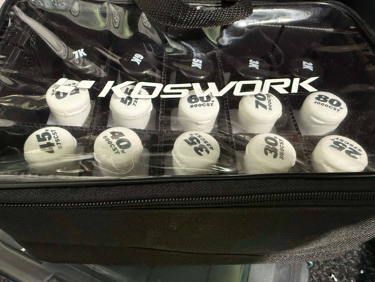 KOSWORK OIL BAG . includes oils